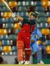 Sean Ervine gave the ball an almighty thump at the death, India v Zimbabwe, VB Series, Brisbane, 6th ODI, January 20, 2004