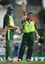 Kamran Akmal celebrates his maiden one-day hundred, Pakistan v West Indies, VB Series, Brisbane, January 19, 2005