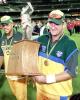 Australian batsman Mark Waugh carries the trophy after Australia won the 2nd one-day final against the West Indies to take out the series 2-0 at the MCG in Melbourne 09 February 2001. Australia amassed the huge total of 338-6 with Mark Waugh topscoring with 173 and in reply the West Indies scored 299 to lose by 39 runs. Waugh faces a meeting tomorrow 10 February with the ICC anti-corruption unit looking into allegations that Waugh was taking bribes from an Indian book-maker.