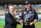 New Zealand batsman Jacob Oram receives the National Bank Player of the Match trophy from National Bank Cricket Manager Gavin Larsen. Oram scored 59 off 57 balls, including three fours and four sixes, and effected the run out of Sri Lankan top scorer Marvan Atapattu for 76, hitting the stumps direct from deep backward point. 5th One-Day International: New Zealand v Sri Lanka at Jade Stadium, Christchurch, 11 February 2001.