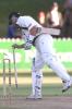 27 Mar 2000: Mark Waugh of Australia souvenirs a stump as Australia wins by six wickets, during day four of the second test between New Zealand and Australia at the Basin Reserve, Wellington, New Zealand.