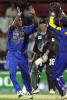 Sanath Jayasuriya celebrates his second wicket with Kumar Sangakkara after the exit of Jacob Oram, ODI2, New Zealand v Sri Lanka, Sharjah, 10 April 2001