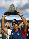 Michael Vaughan holds the Wisden Trophy aloft