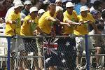 PORT OF SPAIN, TRINIDAD - MAY 24: Australian fans cheer on another Australian boundary during the 4th One Day International between the West Indies and Australia on May 24, 2003 at Queens Park Oval in Port of Spain, Trinidad.