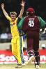 PORT OF SPAIN, TRINIDAD - MAY 24: Ian Harvey of Australia traps Chris Gayle of the West Indies LBW during the 4th One Day International between the West Indies and Australia on May 24, 2003 at Queens Park Oval in Port of Spain, Trinidad.