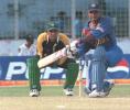 Pakistani skipper and wicket-keeper Moin Khan watches Sri Lanka batman M. Atapattu approach a ball in the sixth match of the limited-overs four-nation Asia Cup, 05 June 2000 in Dhaka. Atapattu, Sri Lanka's highest scorer reached 62 runs before being caught by Imran Nazir. Sri Lanka was restricted to 192 all-out in 49 overs by a spirited Pakistani who earlier comfortably defeated arch-rival India and host Bangladesh to secure a place in the final against Sri Lanka 07 June.