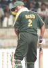 Pakistan batsman Saeed Anwar looks back to see his bails flown away following the bowling of Chaminda Vaas (not in picture) for 13 runs in the one-day international against Sri Lanka 09 July 2000. Singer Triangular Series 2000, 4th Match, Sri Lanka v Pakistan, R.Premadasa Stadium, Khettarama Colombo.