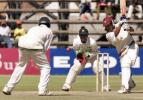 Ramnaresh Sarwan drives watched by Tatenda Taibu, West Indies v Zimbabwe 2nd Test at Harare, 27-31 July 2001.