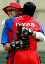 Two Hong Kong players celebrate a wicket, Hong Kong v Bangladesh, 1st ODI, Asia Cup, Colombo, July 16, 2004