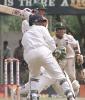 South African batsman Nicky Boje pulls the ball as non-striker Paul Adams looks on during the fourth day of the second cricket test between South Africa and Sri Lanka. South Africa beat Sri Lanka by 7 runs to level the three match series 1-1. South Africa in Sri Lanka, 2000/01, 2nd Test, Sri Lanka v South Africa, Asgiriya Stadium, Kandy, 30July-03August 2000 (Day 4).