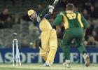 Australian captain Steve Waugh (L) is clean bowled by South African bowler Andrew Hall (R) in an exciting climax to their one day cricket match being played under a closed roof at the Colonial Stadium in Melbourne. Being played in the middle of winter in Melbourne, Australia tied with South Africa's 226-8 but leads the three match series 1-0. South Africa in Australia, 2000/01, 2nd One-Day International, Australia v South Africa, Colonial Stadium, Melbourne, 18 August 2000.