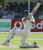 Nasser Hussain sweeps on the way to his hundred against South Africa at Trent Bridge