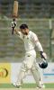 Habibul Bashar celebrates after getting a century against Pakistan in the first Test
