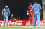 Carlisle on his way back to the pavilion after bowled by Joshi. Coca-Cola Champions Trophy 2000/01, 3rd Match, India v Zimbabwe, Sharjah C.A. Stadium, 22 October 2000