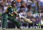 Gary Kirsten makes room for himself and tries to smash the ball through the offside, New Zealand in South Africa, 2000/01, 3rd One-Day International, South Africa v New Zealand, SuperSport Park, Centurion, 25 October 2000.