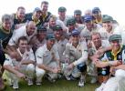 The Australian cricket team poses while celebrating their second test match win against Pakistan at Sharjah's stadium October 12, 2002. Pakistan crumbled to defeat in less than two days of the second test against Australia on Saturday, adding just 53 to their first innings 59 and losing by an innings and 198 runs. Pakistan's match total of 112 was the fourth worst in test history.