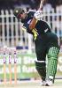 Shoaib Akhtar concentrates on his shot but loses his left bail to Makhaya Ntini, Pakistan v South Africa, 3rd ODI, Faisalabad, October 7, 2003.