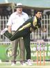 Umpire Darrel Hair and Saqlain Mushtaq in action, Pakistan v South Africa, 3rd ODI, Faisalabad, October 7, 2003.