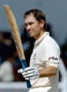 Justin Langer acknowledges the cheers in Australia's second innings, Australians v Mumbai, Mumbai, October 2, 2004