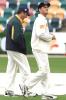 26 Nov 2001: Steve Waugh and Adam Gilchrist of Australia inspect the ground shortly before the match was abandonned due to poor weather, during day five of the second test between Australia and New Zealand, played at Bellerive Oval, Hobart, Australia.