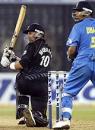Craig McMillan sweeps as Rahul Dravid watches, India v New Zealand, Match 6, TVS Cup, Cuttack, November 6, 2003 Craig McMillan sweeps as Rahul Dravid watches, India v New Zealand, Match 6, TVS Cup, Cuttack, November 6, 2003