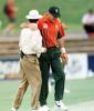 Pat Symcox cuddles umpire Emerson after his confrontation with Cronje ...South Africa v New Zealand ODI, at the Adelaide Oval, Saturday December 6th 1997.