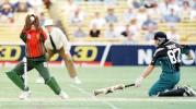 Roger Twose slides in as the return comes in too high to Richardson ....South Africa v New Zealand ODI, at the Adelaide Oval, Saturday December 6th 1997.