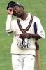 11 Dec 2000: Brian Lara of the West Indies leaves the field after being caught by Martin Love of Australia A off the bowling of Brad Hodge for 231, during day three of the four day tour match between Australia A and the West Indies, at Bellerive Oval, Hobart, Australia.