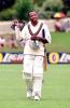 West Indian batman Brian Lara takes his helmet off 11 December 2000, during a match against Australia on the third day of the West Indies Cricket Tour at Bellerive Oval, Hobart. Lara has been nursing a hamstring injury that is defying specialists' prediction of an early cure.