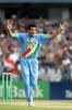 Indian bowler Zaheer Khan celebrates the dismissal of New Zealand batsman Mathew Sinclair, caught by Sourav Ganguly at point for 15. 1st ODI: New Zealand v India at Eden Park, Auckland, 26 December 2002.