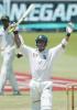 Herschelle Gibbs celebrates scoring the winning runs in Durban, he and Graeme Smith scored the 44 needed to achieve a 10-wicket win over Pakistan in the first Test match, Sun 29 Dec 2002