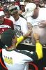 MELBOURNE - DECEMBER 30: Justin Langer of Australia signs an autograph on the stomach of a Barmy Army man during the fifth day of the Fourth Ashes Test between Australia and England at the Melbourne Cricket Ground in Melbourne, Australia on December 30, 2002.