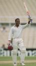 Brian Lara celebrates his double-century