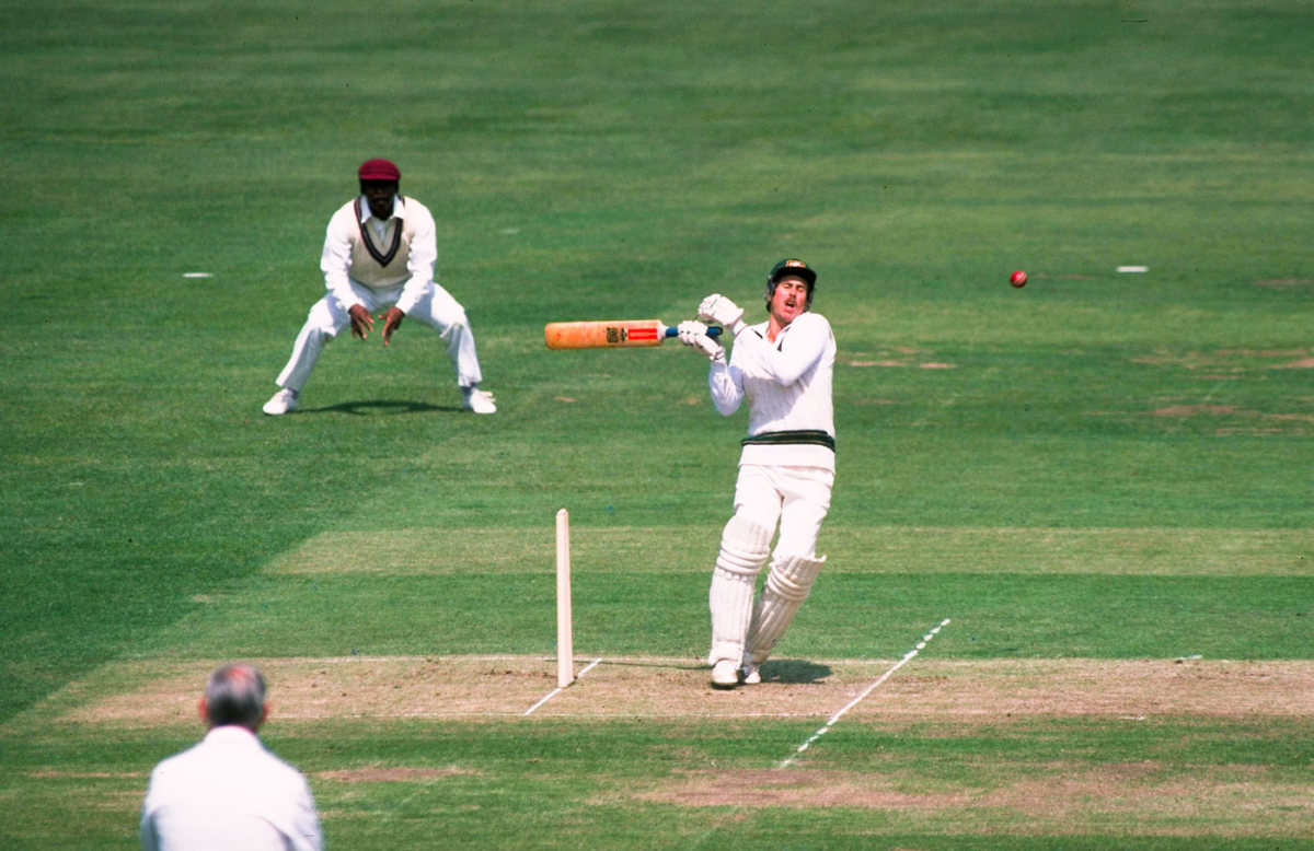 Graeme Wood is hit by a bouncer from Malcolm Marshall