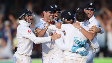 England get into a celebratory huddle
