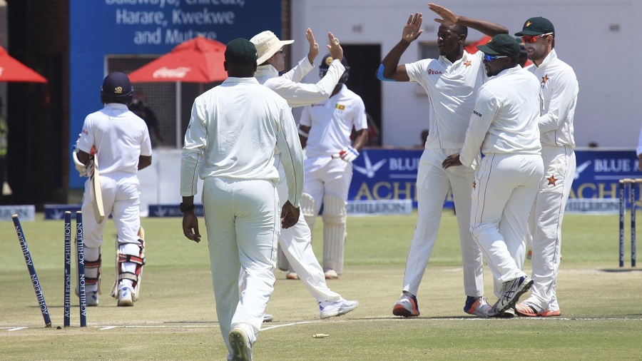 Zimbabwe's players get together to celebrate the dismissal of Kaushal Silva Zimbabwe's players get together to celebrate the dismissal of Kaushal Silva