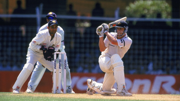 Adam Gilchrist sweeps on his way to 122