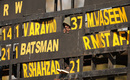 A scorer watches the game from inside the scoreboard, Oman vs UAE, ICC Cricket World Cup Qualifier, Bulawayo, June 21, 2023