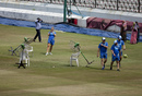 An Australian team support staff member takes picture as the outfield is dried using fans, India v Australia, 3rd T20I, Hyderabad, October 13, 2017