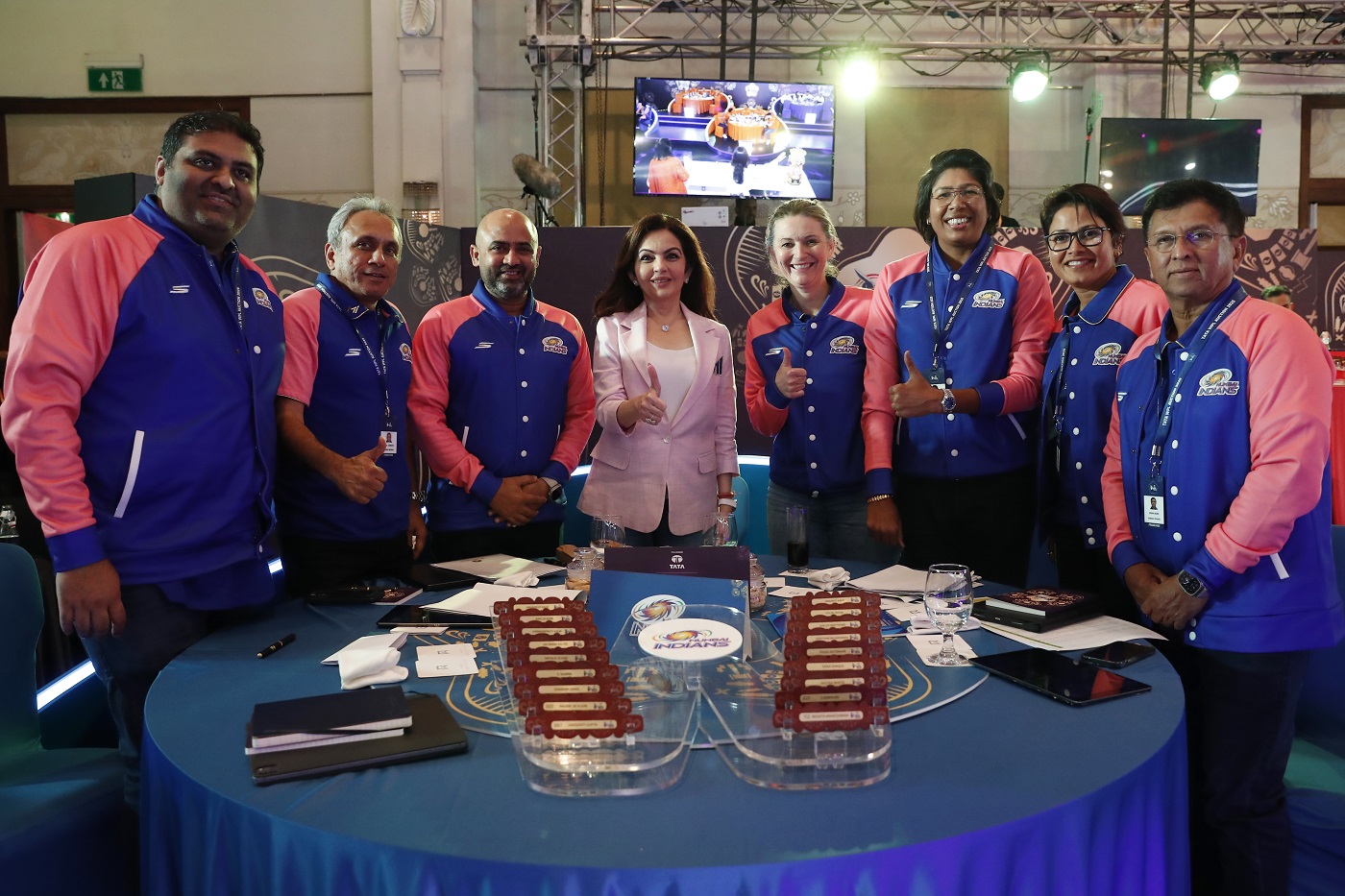 Edwards (fourth from right) is part of the Mumbai Indians brains trust in the WPL, having coached them to two titles