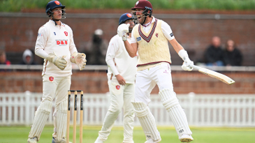 Rew hundred, Overton grit help Somerset to first win of season