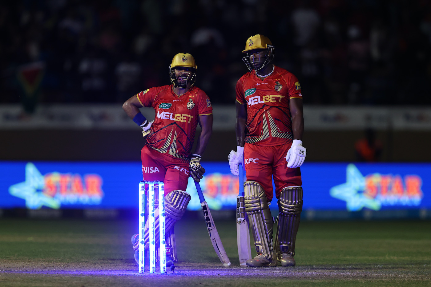 It's lit, fam: Nicholas Pooran and Andre Russell navigate by stumplight