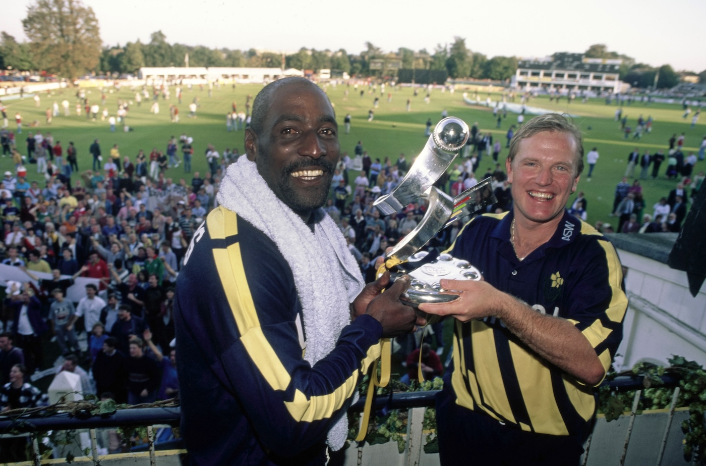Hugh Morris (right), the former Glamorgan chief executive, in his playing heyday, lifting the Sunday League trophy with Viv Richards in 1993